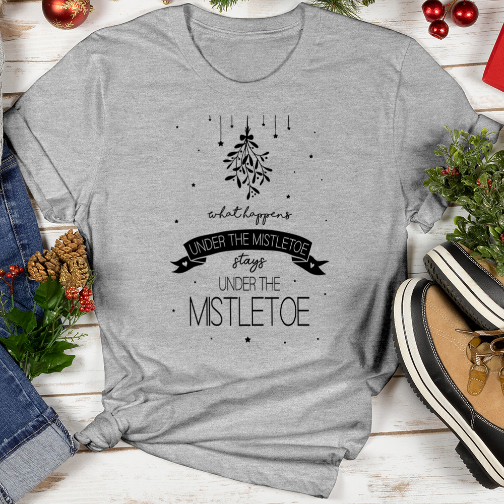 What Happens Under the Mistletoe Softstyle Tee